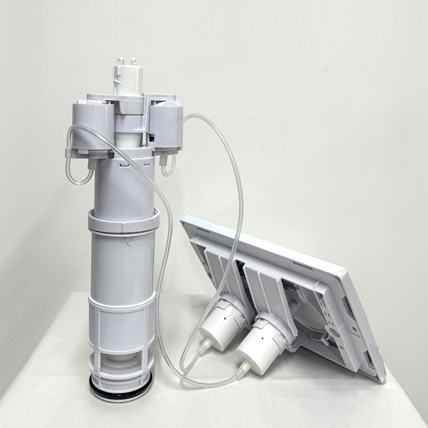 Easy-to-clean pneumatic flush toilet panels for low maintenance