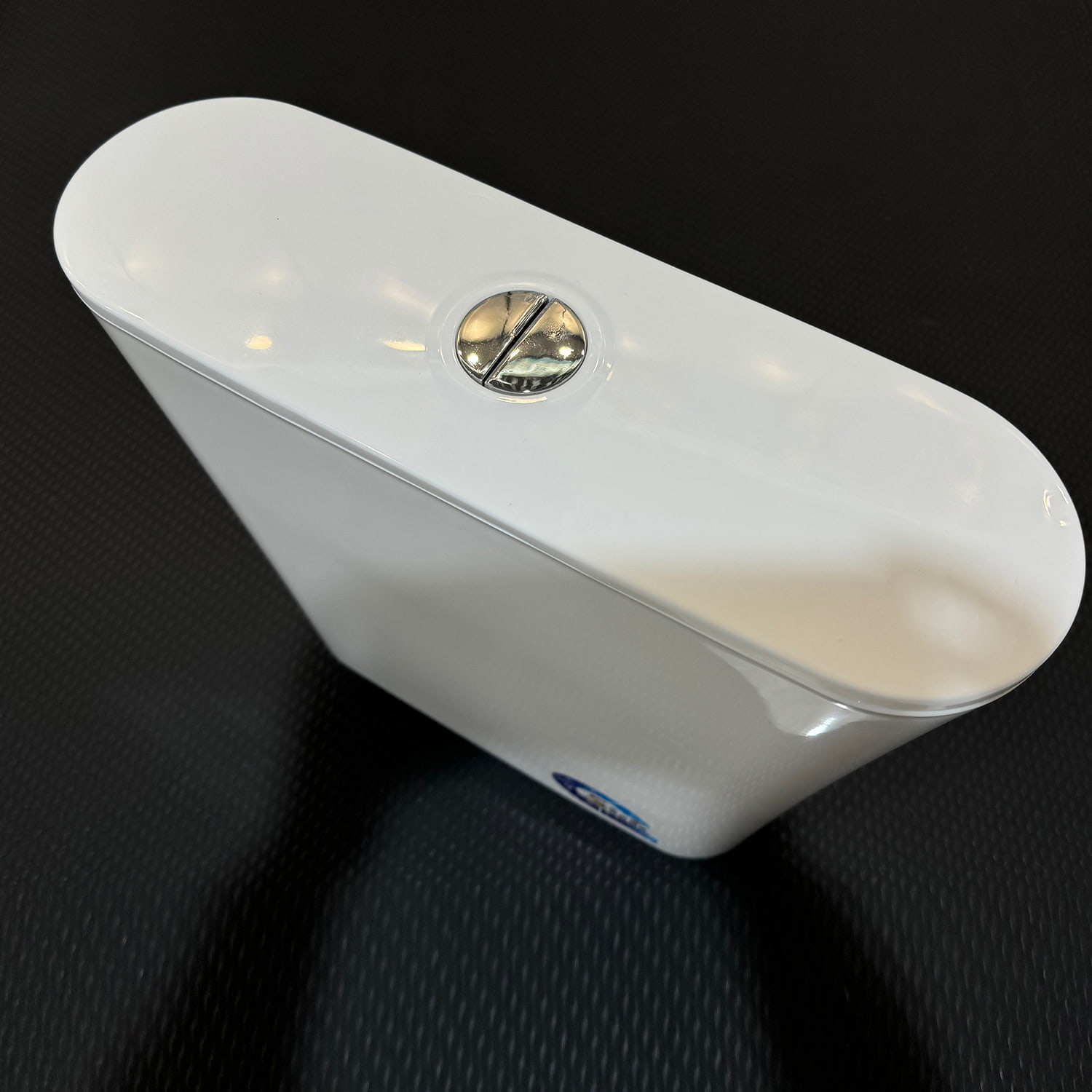 Exposed flush tank with long rail for vintage bathrooms